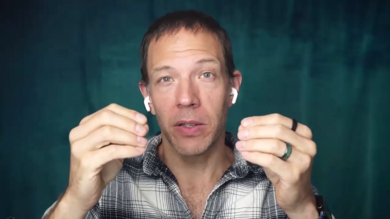 Jason Lange holding two imaginary magnets close together, a picture of the tension flirting plays with